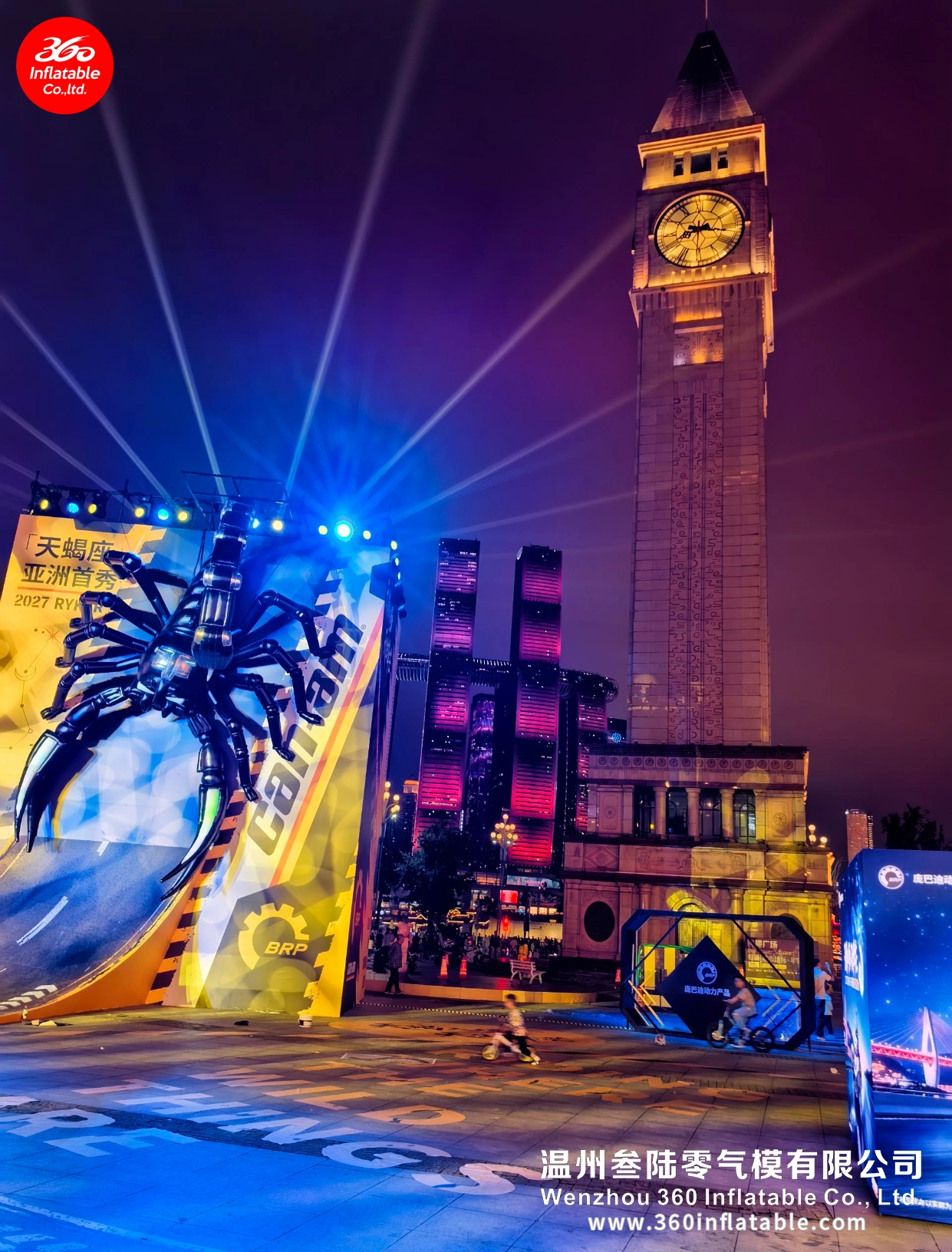 Spectacular city nightscape with the mechanical scorpion inflatable at the BRP event interacting with a magnificent drone show in the background.