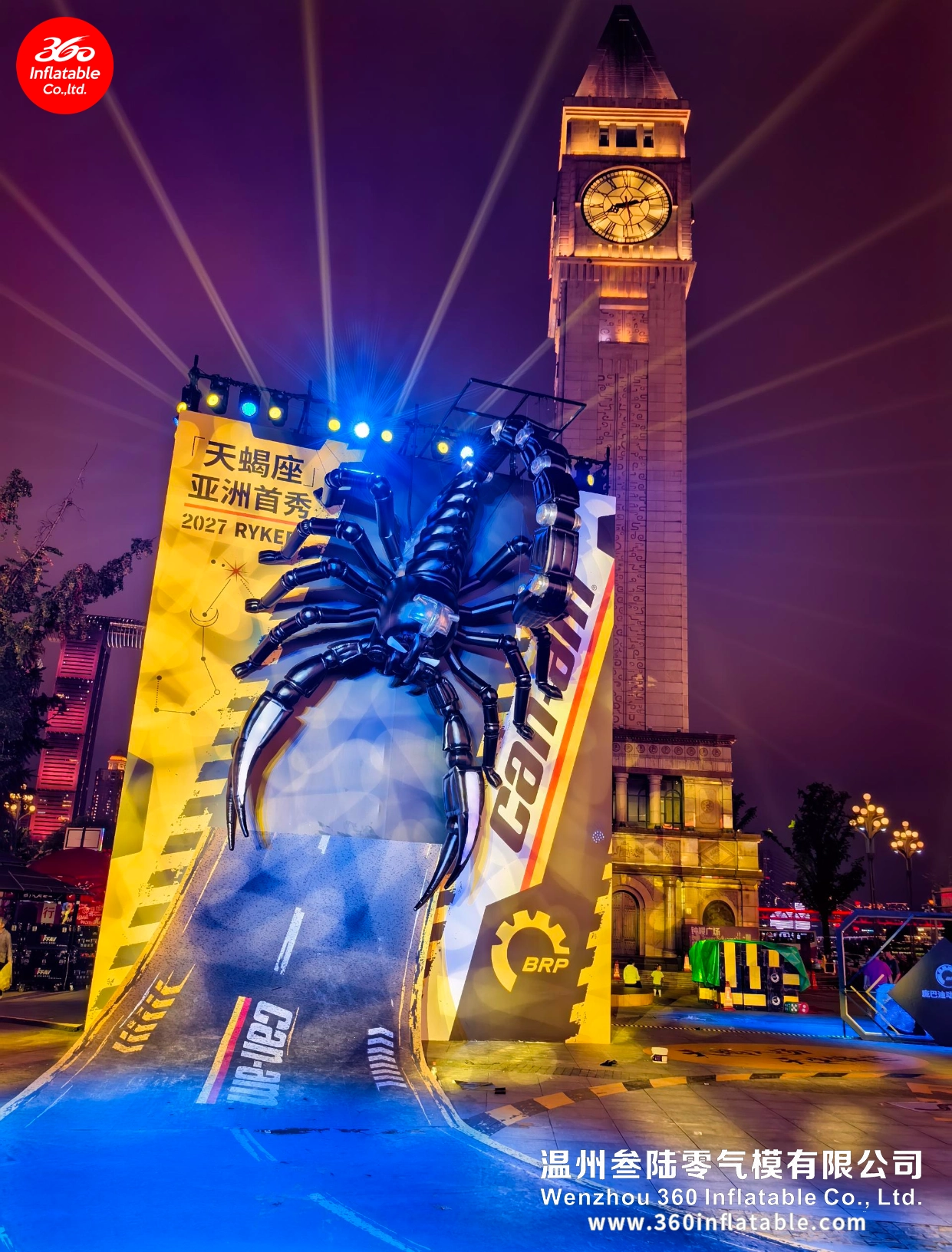 Night panoramic view of the BRP Can-Am Ryker Scorpio mechanical inflatable in front of a clock tower during the Asia Premiere event.
